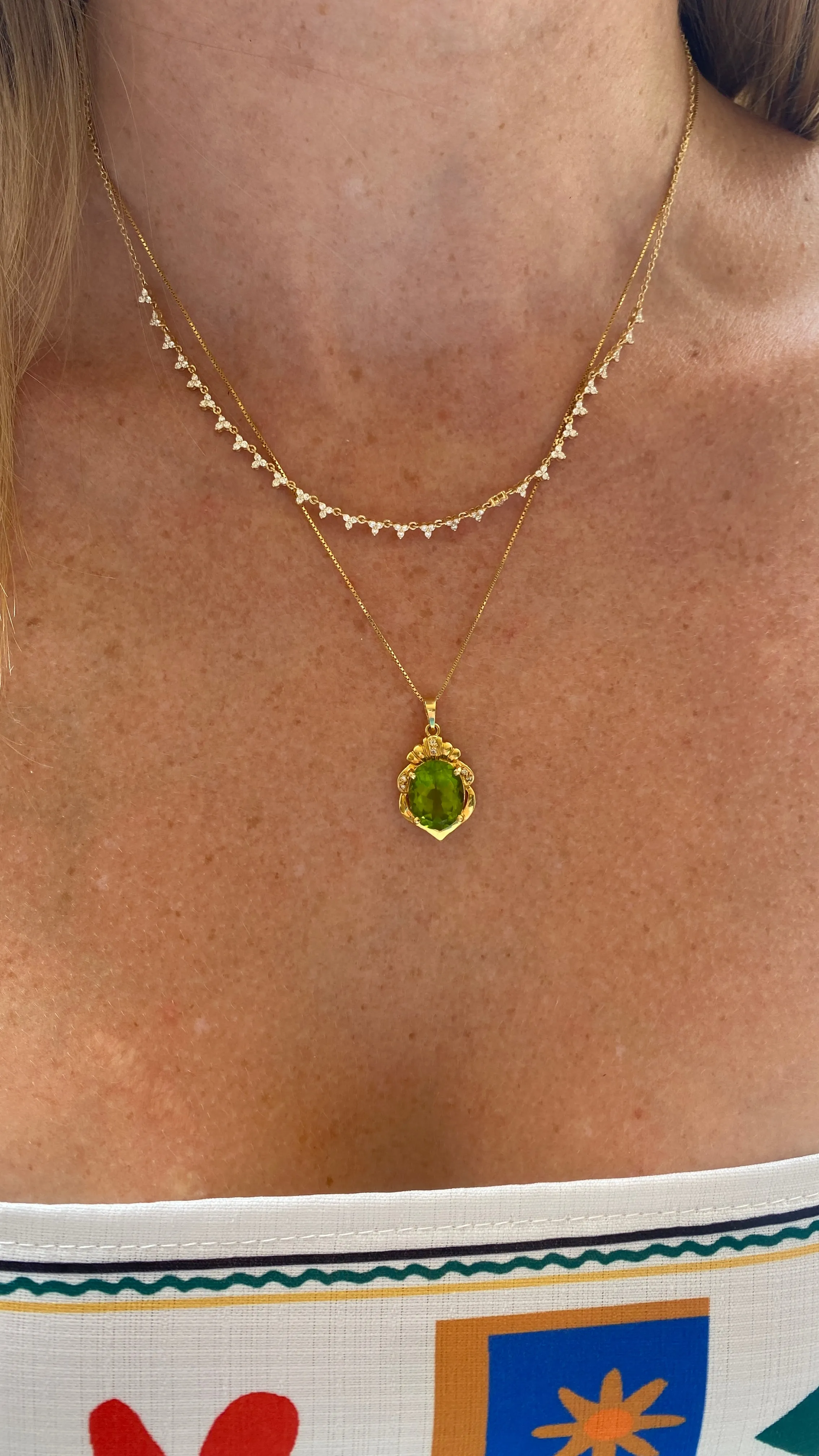 18k 15.63ct Peridot Crest Pendant with a 14k Box Chain